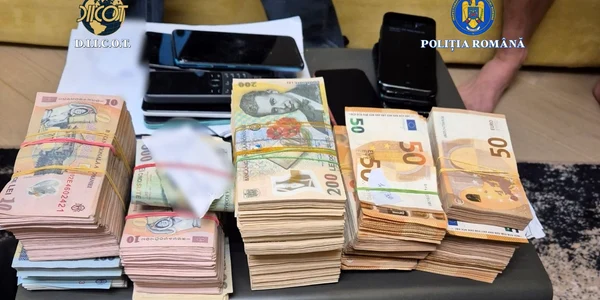 Percheziții într-un dosar privind funcționarea unui site pe care putea fi comandat un asasin plătit în criptomonede