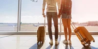 Cuplu - bagaje - aeroport- vacanta - turism - FOTO Shutterstock 