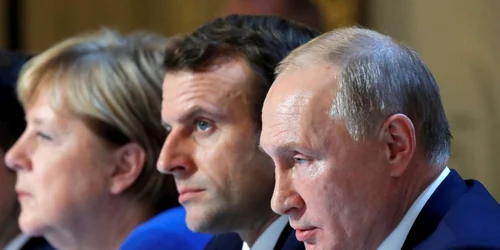 Angela Merkel Emmanuel Macron Vladimir Putin FOTO EPA-EFE