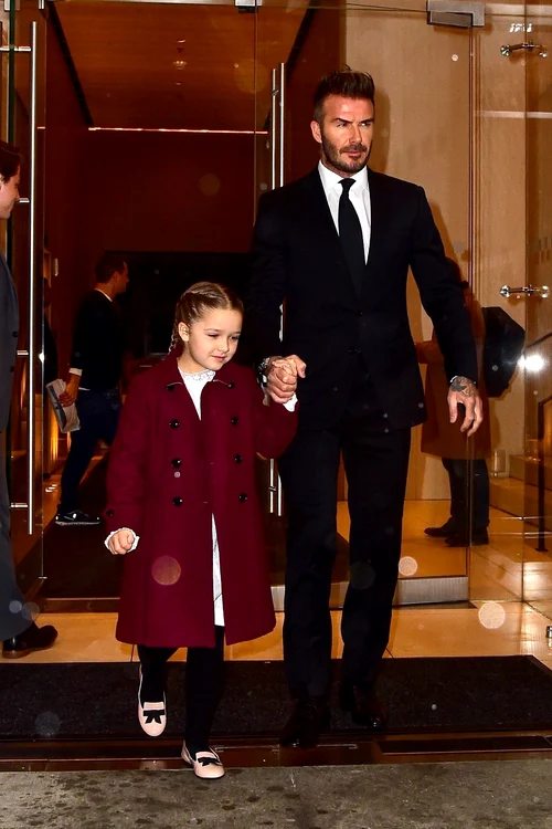 David Beckham and his kids Cruz, Harper, and Romeo leave their hotel during NYFW jpeg