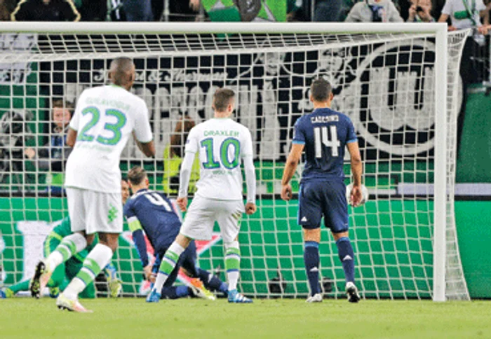 
    Jucătorii Realului au fost spectatori la golurile nemţilorFoto: AP  