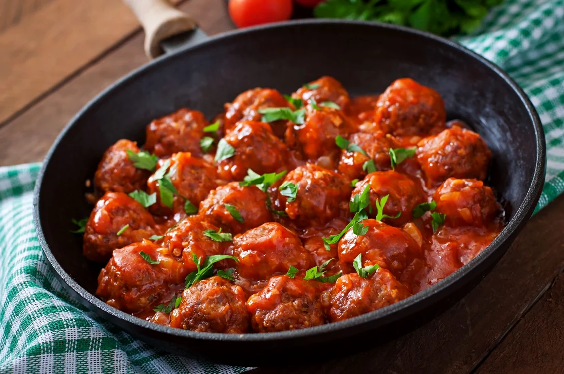42724759   meatballs in sweet and sour tomato sauce jpeg