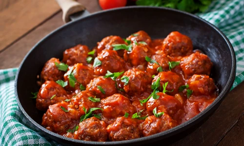 42724759   meatballs in sweet and sour tomato sauce jpeg