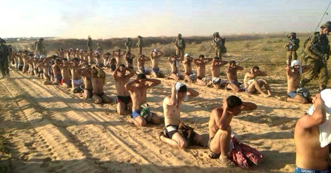 Prizonieri palestinieni, păziţi de soldaţii israelieni FOTO Reuters