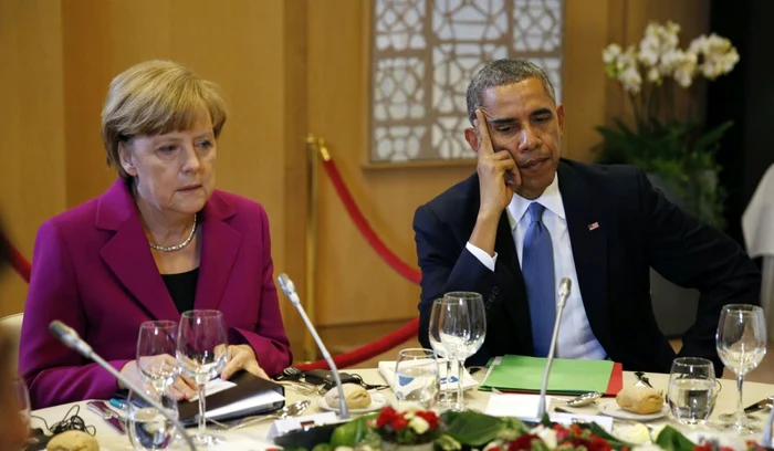 Cancelarul german, Angela Merkel, alături de preşedintele SUA, Barack Obama, pe 4 iunie 2014, înainte de summitul G7 de la Bruxelles FOTO Reuters