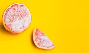 frozen grapefruit yellow background jpg