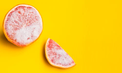 frozen grapefruit yellow background jpg