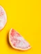 frozen grapefruit yellow background jpg