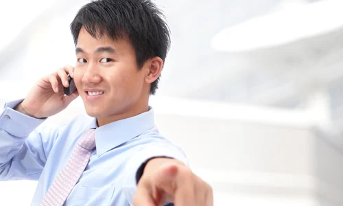 smiling businessman on phone jpeg