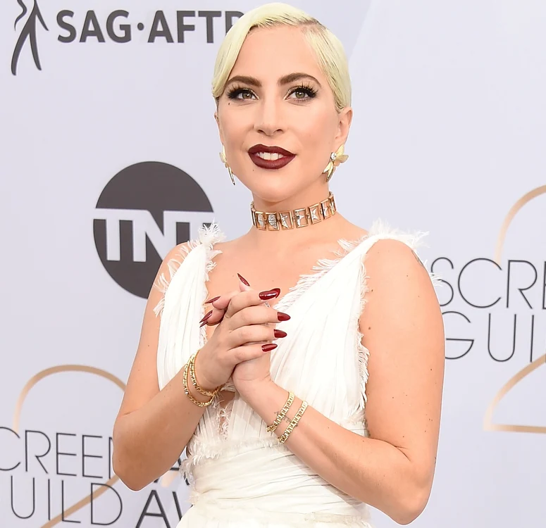 
    Lady Gaga în vârstă de 32 de ani a purtat o rochie Dior Haute Couture la gala Premiilor Sindicatului Actorilor AmericaniFoto: Guliver / Gettyimages  