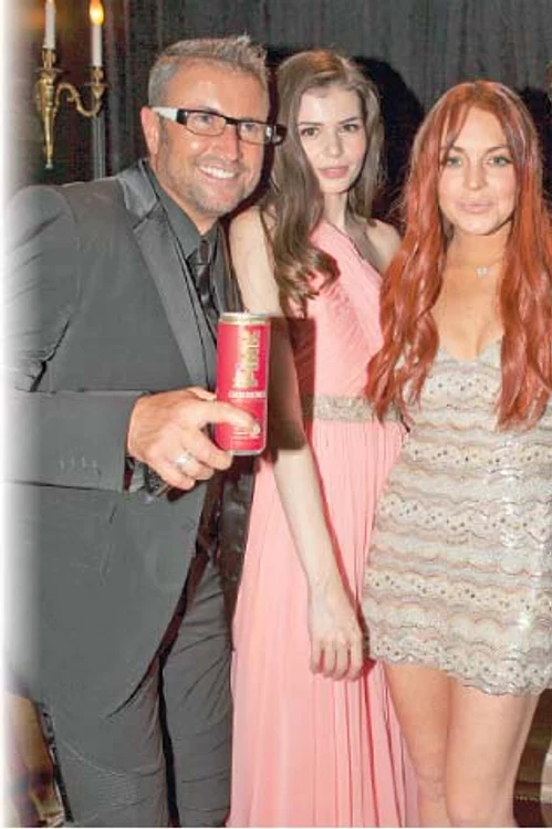 
    Cătălin Botezatu a stat  toată seara la masă cu  Monica Gabor şi  Lindsay Lohan  