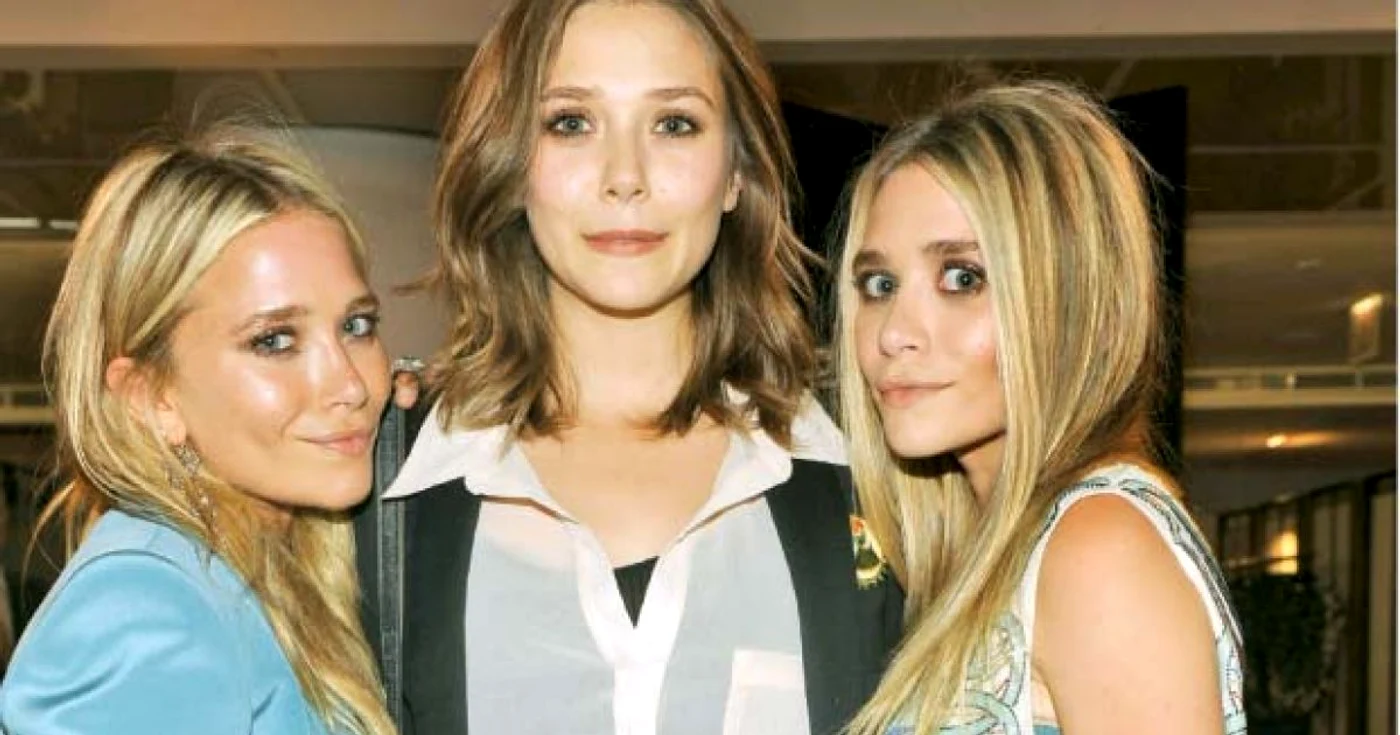 Elizabeth Olsen (centru), alături de surorile mai mari, Mary Kate şi Ashley