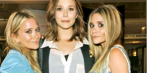 Elizabeth Olsen (centru), alături de surorile mai mari, Mary Kate şi Ashley 