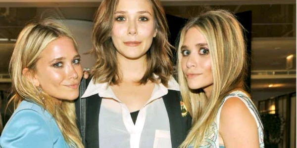 Elizabeth Olsen (centru), alături de surorile mai mari, Mary Kate şi Ashley 