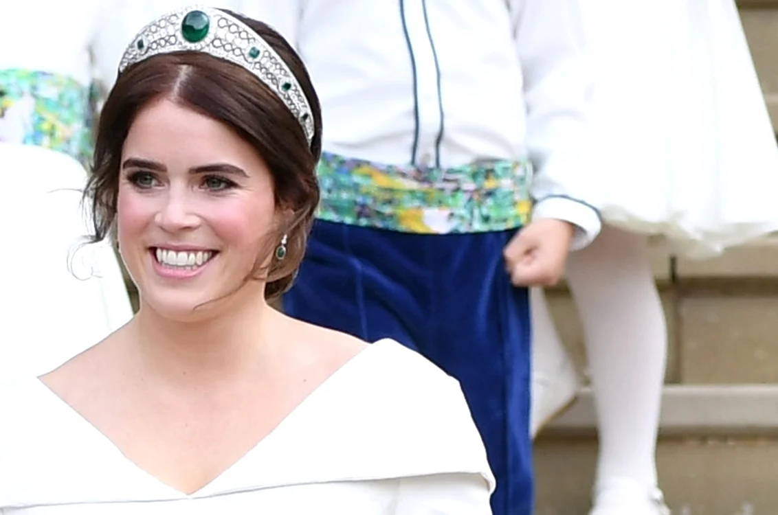 
    Prințesa Eugenie și soțul ei, Jack Brooksbank, la petrecerea de nuntăfoto: AFP PHOTO / BUCKINGHAM PALACE / ALEX BRAMALL   