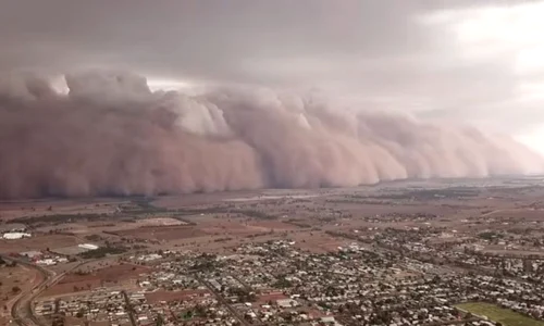 VIDEO / Fenomene meteo extreme în Australia: grindină, inundaţii şi un nor de praf care a schimbat ziua în noapte  jpeg