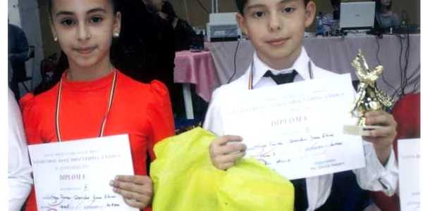 Perechea Florian Stoica şi Diana Gheordun s-a clasat pe locul 3, la categoria 10-11 ani, la dans sportiv