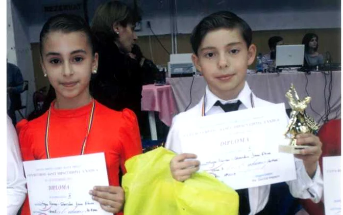 Perechea Florian Stoica şi Diana Gheordun s-a clasat pe locul 3, la categoria 10-11 ani, la dans sportiv