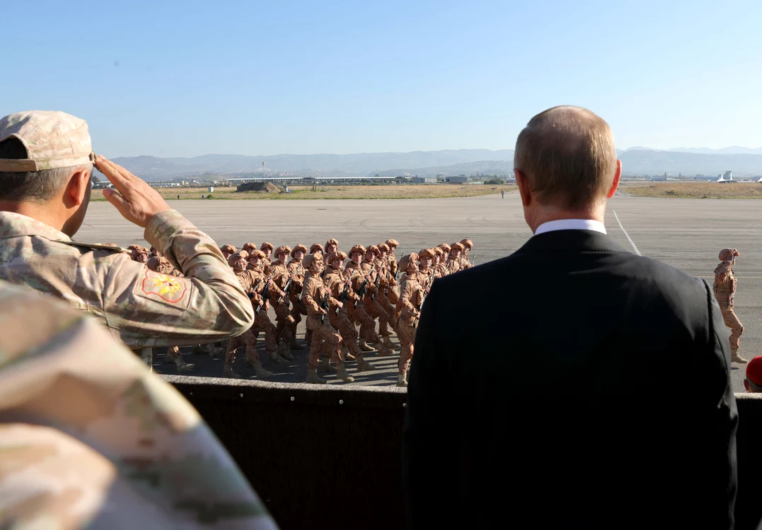 Vladimir Putin în vizita la baza siriană Khmeimim în 2017 MICHAEL KLIMENTYEV / SPUTNIK / K