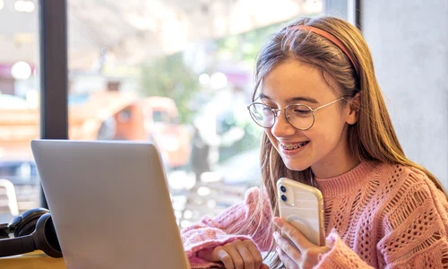 happy teenage girl is working laptop distance education jpg