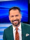 Alex Constantin prezintă Știrile de dimineață la România Tv foto: arhiva personală 