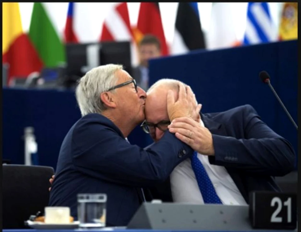 Imaginea originală, cu Juncker şi Timmermans