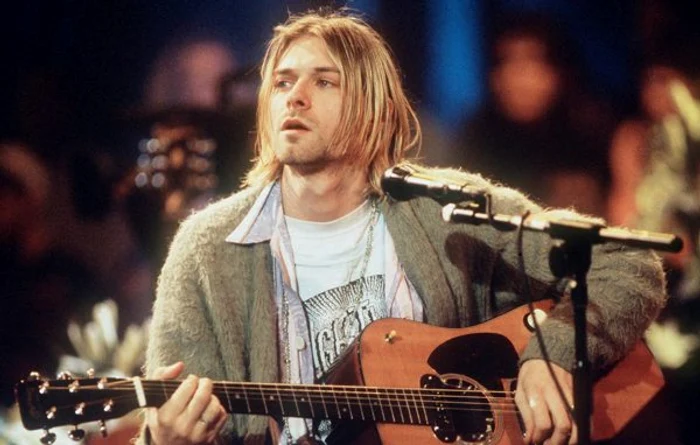 Kurt Cobain și Courtney Love, alături de fiica lor, Frances Foto Gettyimages