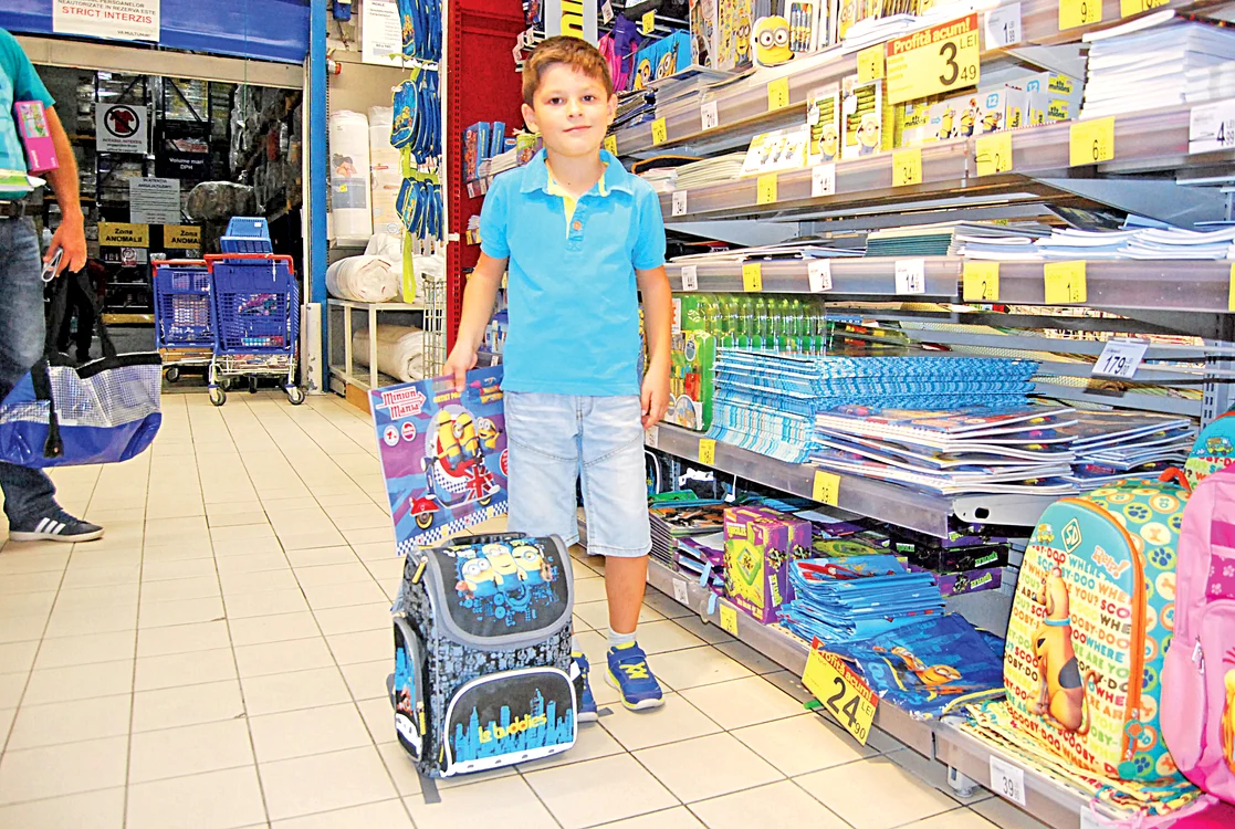 Vlăduţ are şapte ani şi intră în clasa I. Ne-a spus că-şi doreşte un ghiozdan cu Minioni