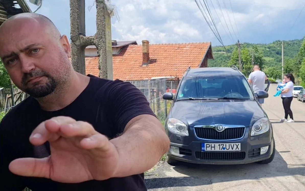 Fratele primarului din comuna Şotrile, în momentul în care a agresat jurnaliştii prezenţi duminică în comună, în timpul alegerilor locale FOTO Diana Frîncu