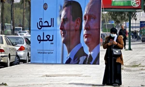 Siria - panou cu Bashar Al Assad si Putin FOTO AFP