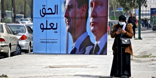 Siria - panou cu Bashar Al Assad si Putin FOTO AFP