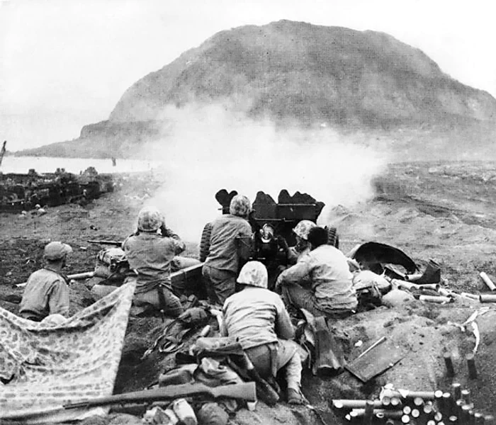 37mm Gun fires against cave positions at Iwo Jima 1 jpg jpeg