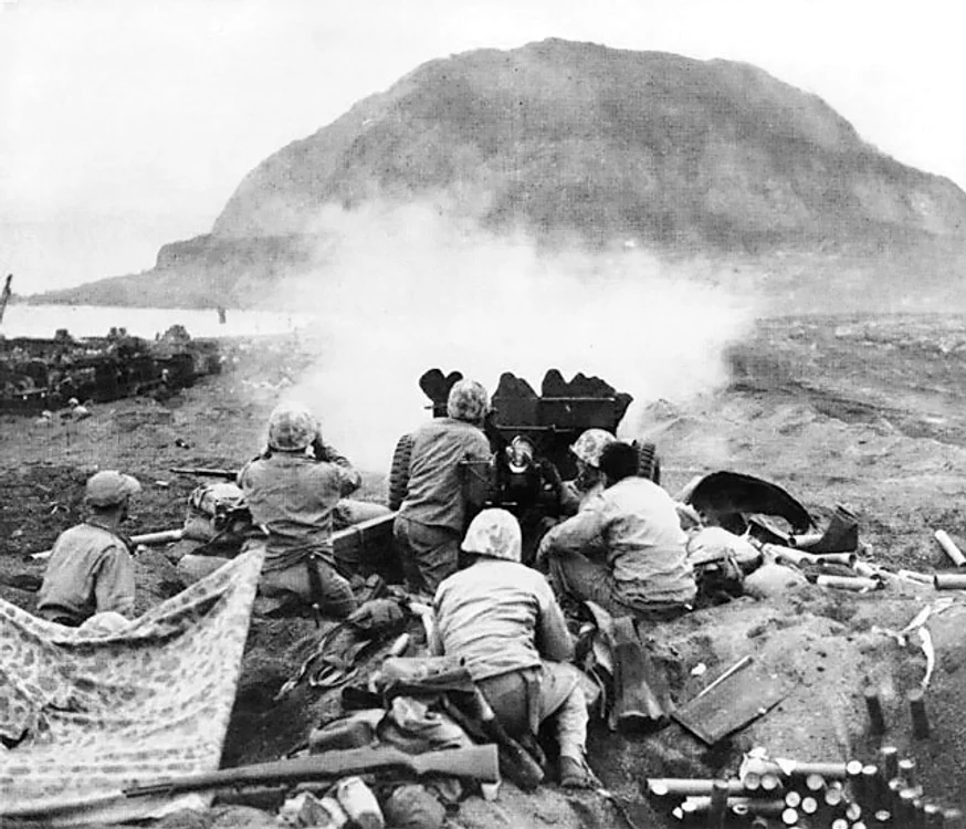 37mm Gun fires against cave positions at Iwo Jima 1 jpg jpeg