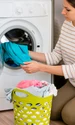 casual woman doing laundry jpg