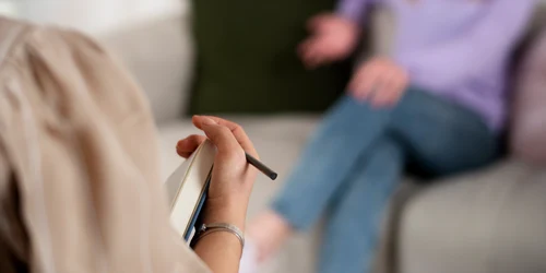 sided view young girl talking therapist resized (1) jpg