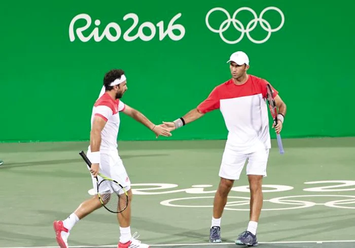 
    Horia Tecău şi Florin Mergea  