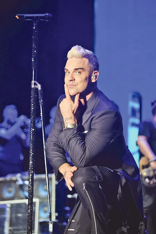 Robbie  Williams,  de 45 de ani,  e dependent  de sex