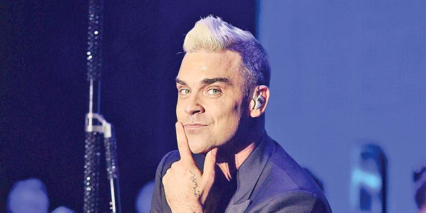 Robbie  Williams,  de 45 de ani,  e dependent  de sex jpeg