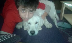 Tudor Orban, într o fotografie mai veche, alături de Lance, cățelul familiei jpeg