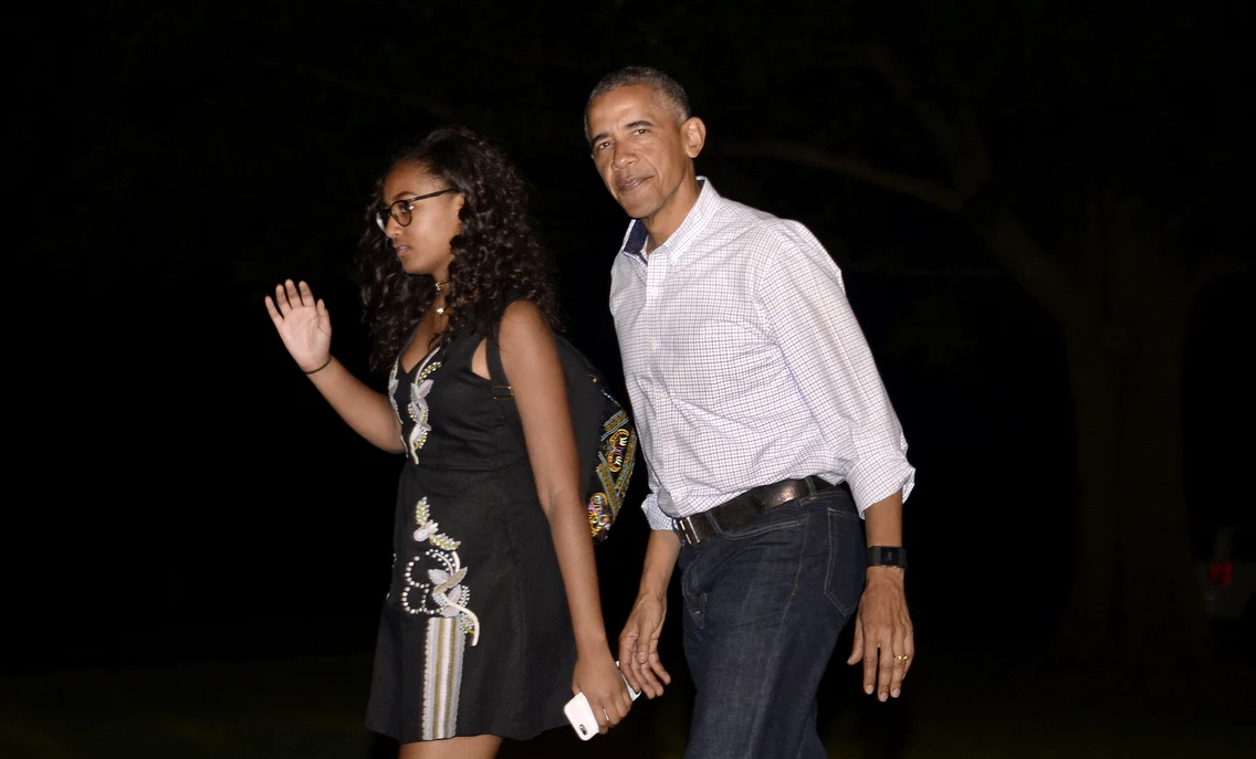 Barack Obama cu Sasha. FOTO: Getty Images