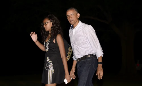 Barack Obama cu Sasha. FOTO: Getty Images