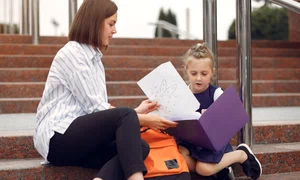 mother prepare little daughter school jpg