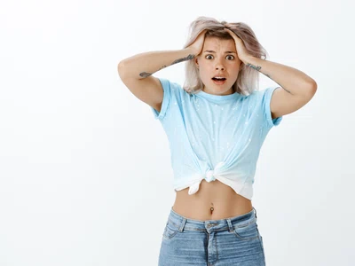 portrait anxious blonde girl posing studio jpg