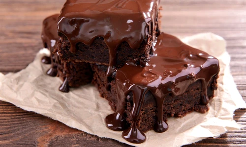Delicious chocolate cakes on table close up jpeg
