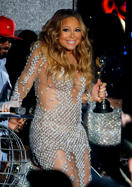 Singer Mariah Carey reacts after receiving the Pop Icon Award during the World Music Awards in Monte Carlo jpeg