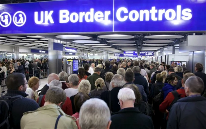 Criza vizelor electronice în Marea Britanie. Până la 700.000 de imigranți riscă să rămână fără dovada statutului legal