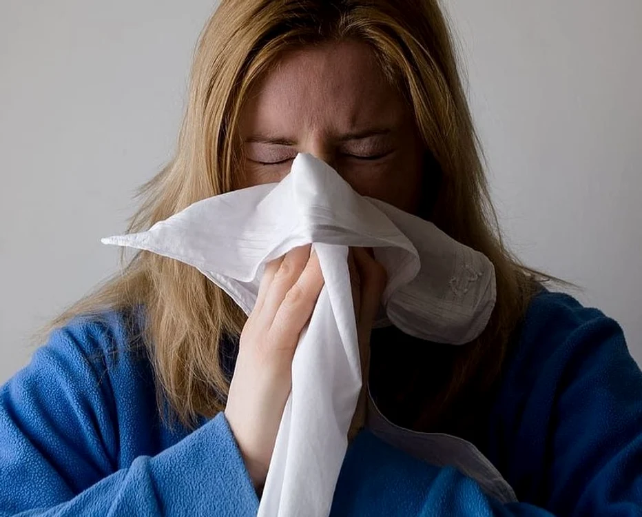 2 woman blow blowing nose jpg jpeg