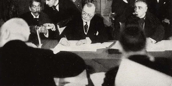RomanianPMMarghilomanSigningBucharestPeaceTreaty1918 jpeg