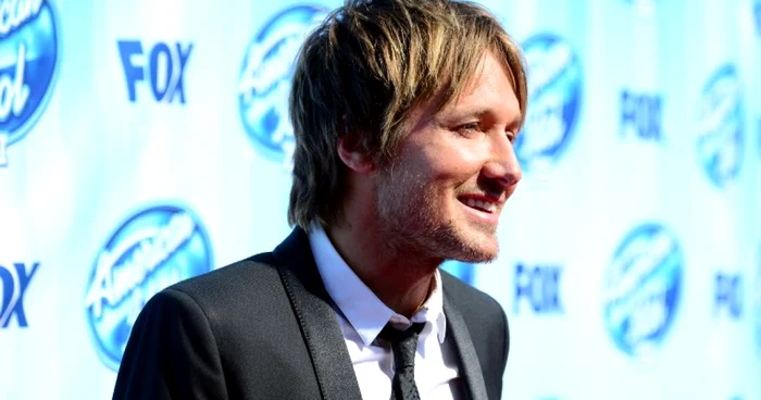 Keith Urban, în vârstă
de 46 de ani, este un apreciat cântăreţ de muzică country, care a
fost recompensat cu numeroase premii, printre care şi patru Grammy
FOTO AFP