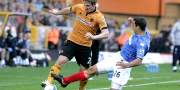 Kevin Doyle (stânga) a deschis şirul golurilor lui Wolverhampton